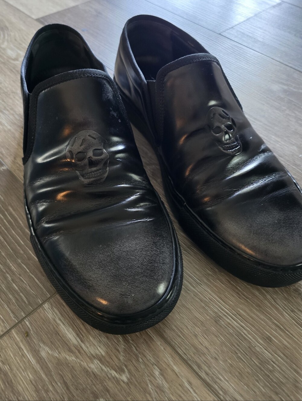 Alexander McQueen Men's Distressd Black Leather Loafers with Embossed Skull